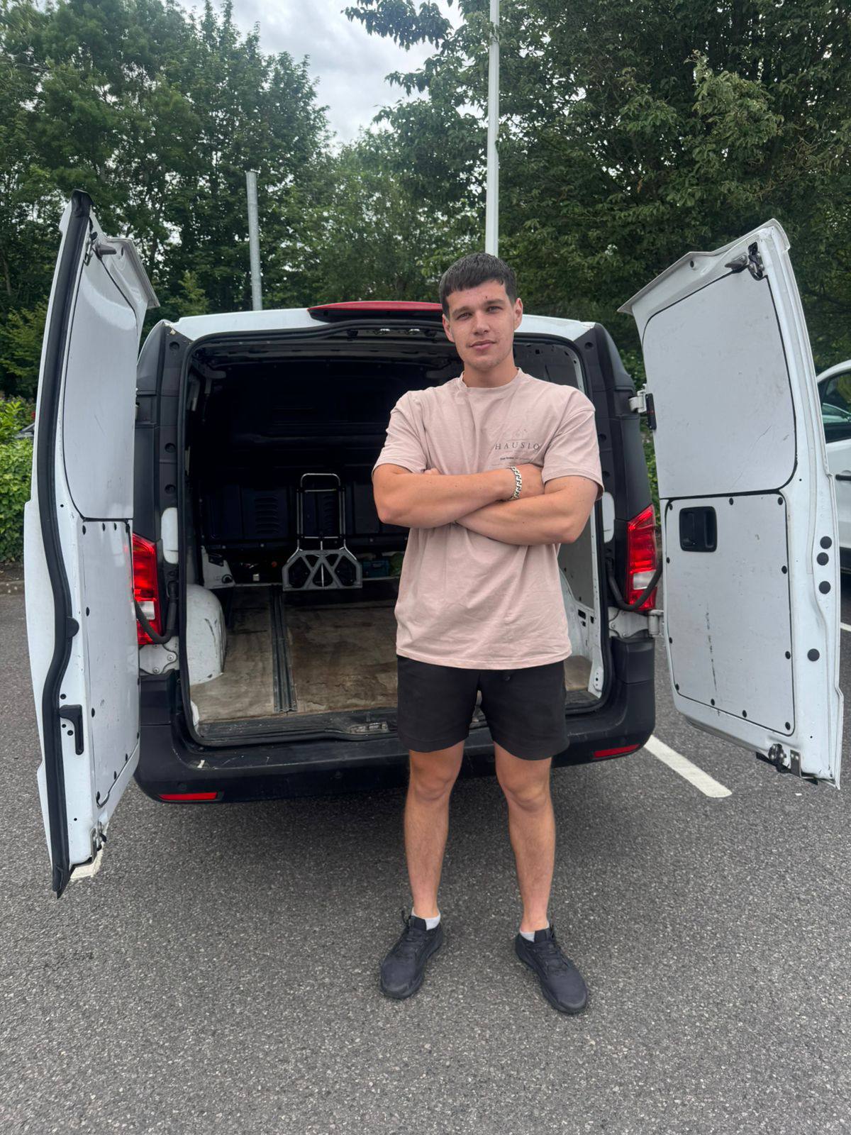 Hausio team member with the branded van, ready for a London move